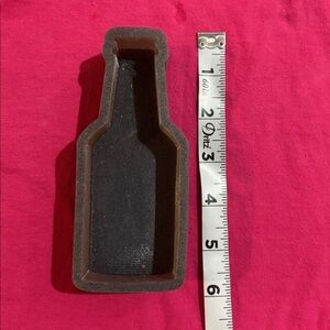 Brown Bottle-Shaped Mold
